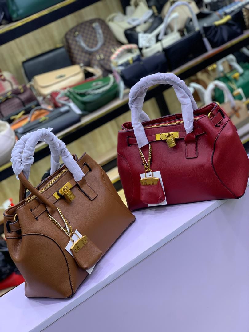 BROWN AND RED PADLOCKED DESIGNED BAG